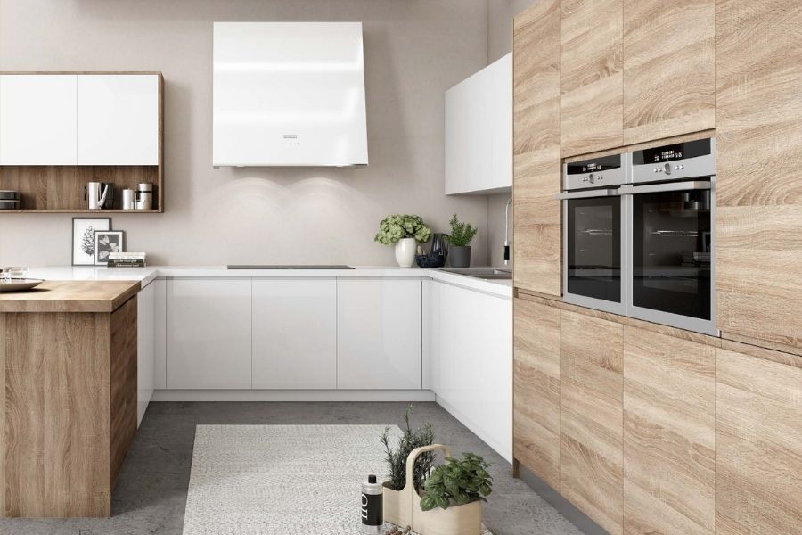 Puertas de cocina blancas con tirador integrado JPull para renovar armarios sin obra. Diseño minimalista en blanco brillo o mate con bisagras incluidas.
